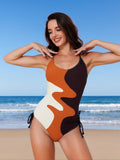 2026 New Women's One-Piece Swimsuit: Earth Tone Abstract Color Block with Halter Neck and Side Ties