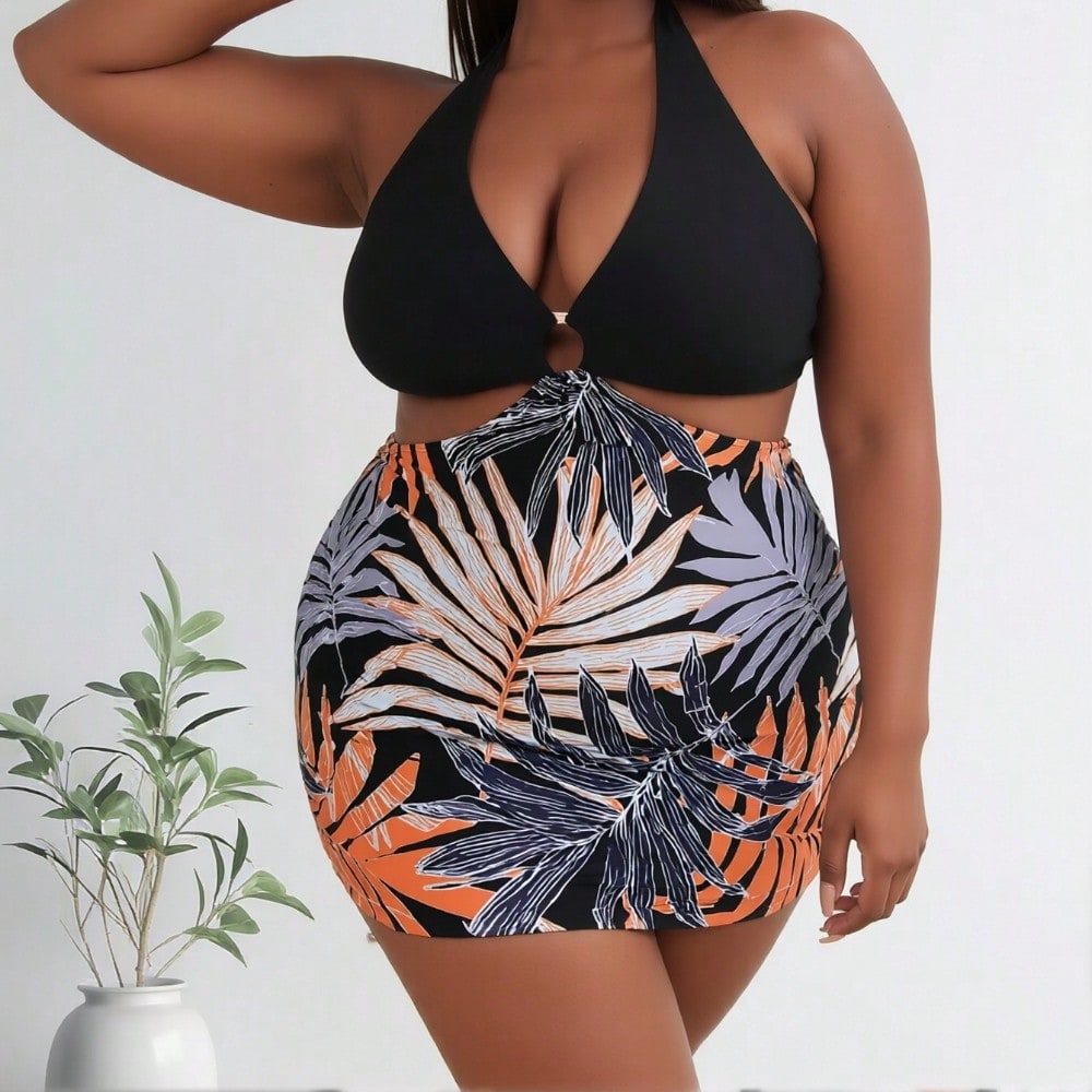 2026 Women's Vibrant Plus Size One-Piece: Black Halter Top with O-Ring and Tropical Palm Leaf Print Skirted Bottom