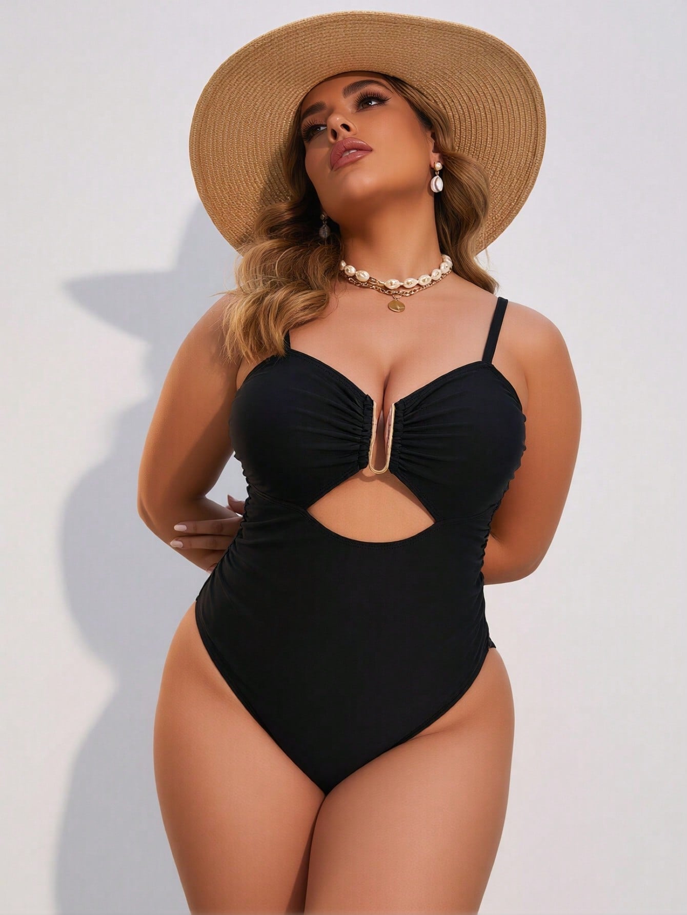 2026 New Women's Plus Size One-Piece Swimsuit: Solid Black, Gold U-Ring Cutout Detail, Ruched Bust, High-Cut Leg, Sleek Beach Style